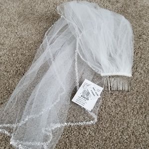 Ivory Fingertip length veil with beaded trim